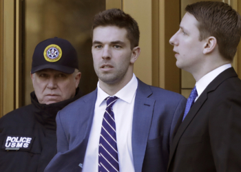 Billy McFarland, the promoter of the failed Fyre Festival in the Bahamas, leaves federal court after pleading guilty to wire fraud charges, Tuesday, March 6, 2018, in New York. He faces a sentence of 8 to 10 years. (AP Photo/Mark Lennihan)