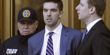 Billy McFarland, the promoter of the failed Fyre Festival in the Bahamas, leaves federal court after pleading guilty to wire fraud charges, Tuesday, March 6, 2018, in New York. He faces a sentence of 8 to 10 years. (AP Photo/Mark Lennihan)